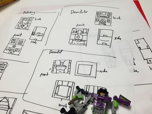 squidinkgames's tweet photo. Having fun sketching up what'll become the texture maps for our little transformers :D #playhack http://t.co/NO2rgIJwAB