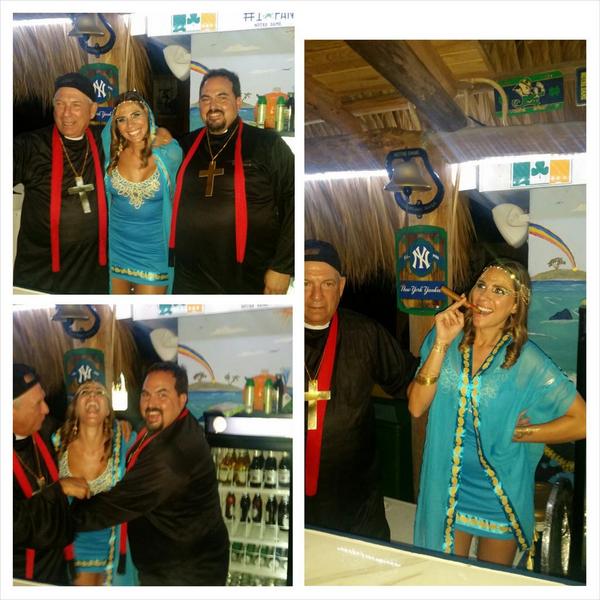 Reyzor28's tweet photo. As usual, I end up behind the bar...with the Priests!  Lol. #fathermayi #tajmyhall #halloweenparty http://t.co/wERlAJe8bs
