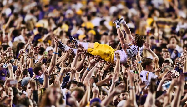 TheMikeUlatoski's tweet photo. One of the pics of the year.  2014 @ArmyAllAmerican Trey Quinn crowd-surfing.  @MOONWALKER_Gear #MoonwalkerNation http://t.co/oacIMQhwkQ
