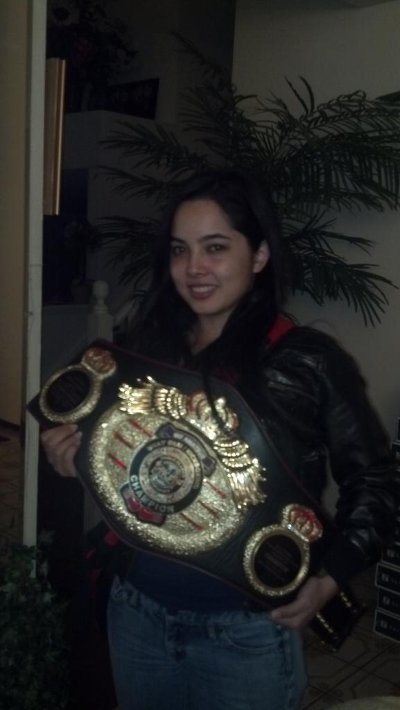 Out_Kawaii's tweet photo. My gf holdin my champion ship belt!! ;) http://t.co/t625VfdqYq