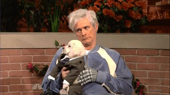 cjzero's tweet photo. Here's Jim Carrey holding a puppy dressed in a suit #SNL http://t.co/u3joyFpLOJ