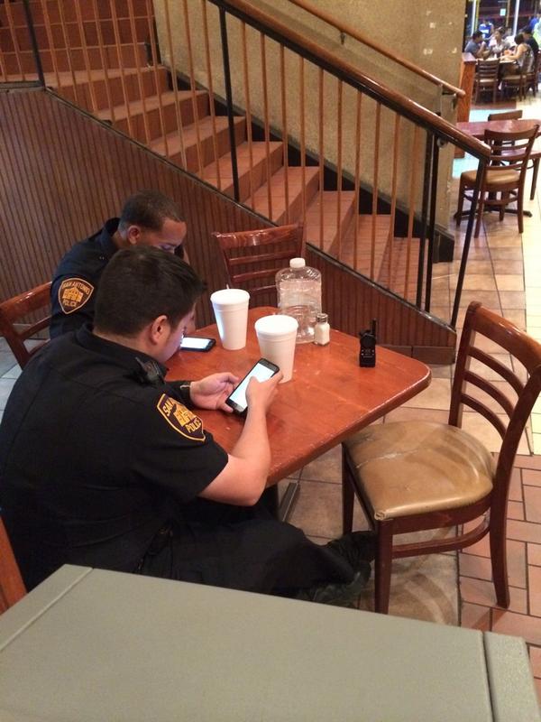 PaxBuckley's tweet photo. SA's finest hard at work tonight http://t.co/q99QSar4DG