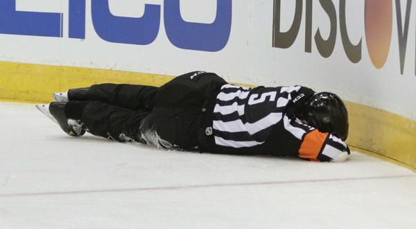 Sportsnet's tweet photo. #NHL officials are often in the line of fire. Here are some of the injuries they’ve endured http://t.co/mjsSL0ORTD http://t.co/vB70F3kZ1n
