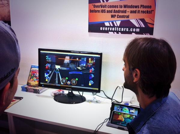 WeAreMuesli's tweet photo. our booth neighbors @InteractivePrj showcasing @OverVolt_csc Day Three #IGDS2014 @MilanGamesWeek http://t.co/MQ4d8HPgpF