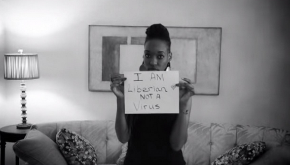 washingtonpost's tweet photo. "I am Liberian. Not a virus." The campaign fighting Ebola stigma http://t.co/htfszVVnNA http://t.co/nFjfT9q6GN