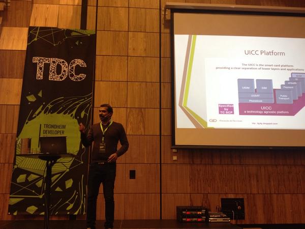 skalldar's tweet photo. @erpwebparts employee Senthuran disects the SIM card. Interesting stuff! #tdconf http://t.co/GDNYR7ZmWN