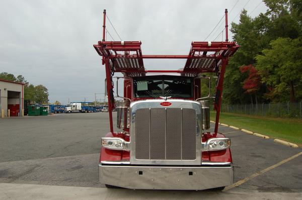ECTTS's tweet photo. It was a bit overcast today, but this #Peterbilt carhauler certainly brightened things up. #ectts http://t.co/7Bi1obCPG9
