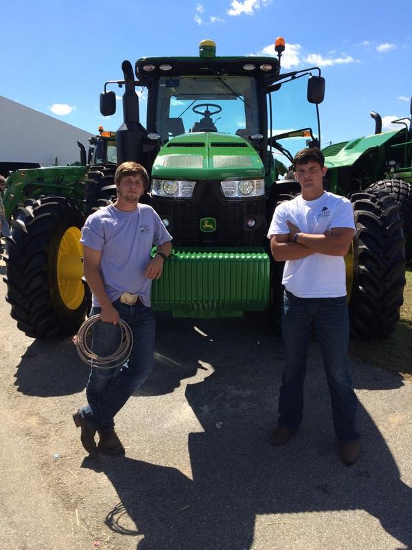 FarmHay's tweet photo. Just bought us a new tractor at the Expo #AHF #ohbaleyeah http://t.co/PPVWztKgJj
