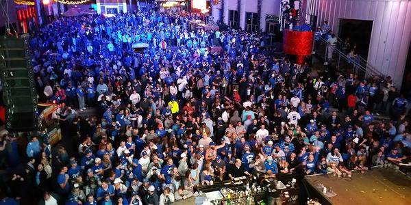MLB's tweet photo. This is Kansas City's Power &amp; Light District right now. @Royals fans are loving life right now. #WorldSeries http://t.co/gRcpVxBYeS