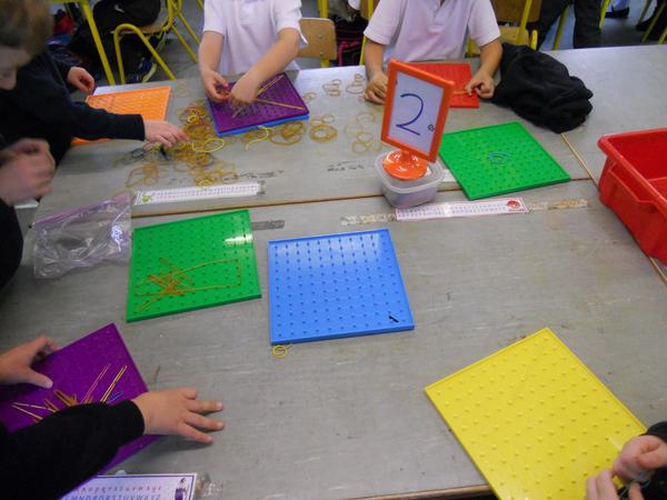 mshester2014's tweet photo. Having fun doing our maths stations for #MathsWeek2014 @mathsweek http://t.co/9g0rzO8Fq8