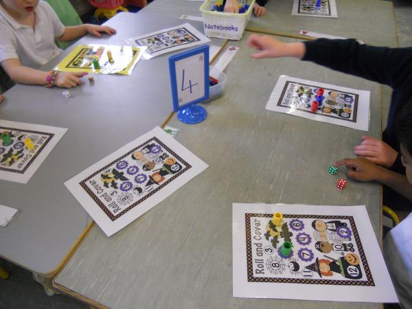 mshester2014's tweet photo. Having fun doing our maths stations for #MathsWeek2014 @mathsweek http://t.co/9g0rzO8Fq8