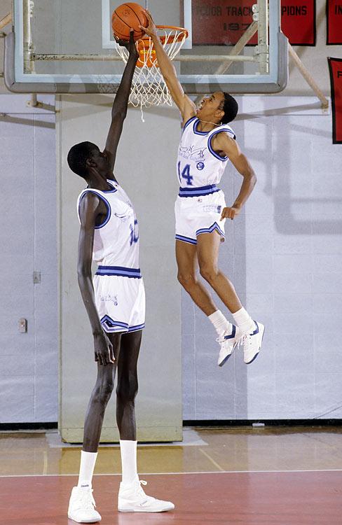 Manute and Spud, classic photo! Happy Birthday Manute Bol. 