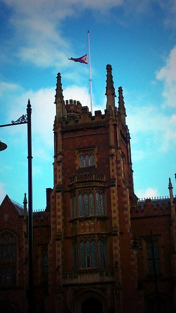 The university flag at half mast on the Lanyon Building today as a mark of respect for Enda Dolan #RIP