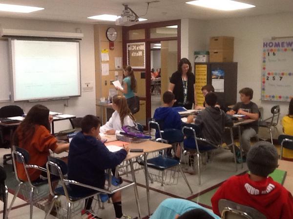 dellingeramsb's tweet photo. Eighth grade students reviewing Algebra homework with Ms. Kile this morning. #AmityReg5 http://t.co/KTbHdwgRlg