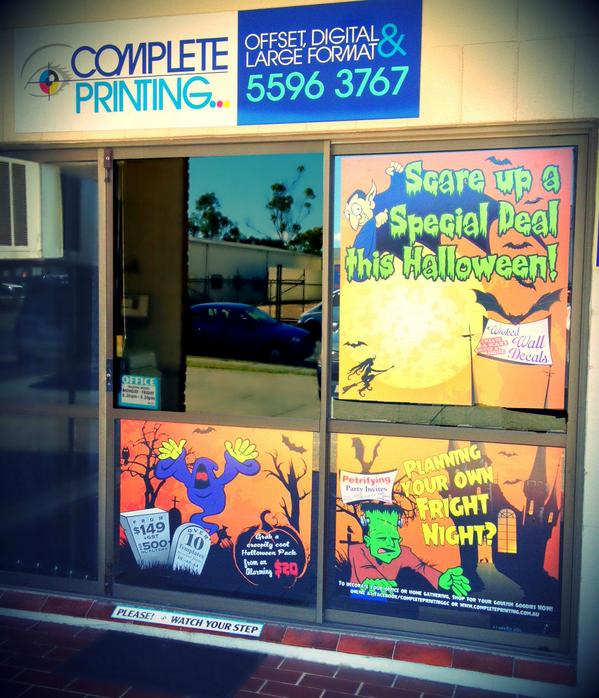 PrintGC's tweet image. Putting our #polyvinyl to good use with our #Halloween window display