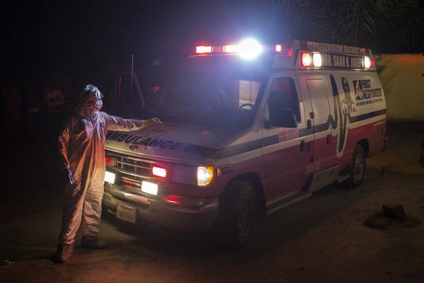 nytimes's tweet image. Ambulance workers in Monrovia, Liberia, fight Ebola street by street nyti.ms/1qE9zzs