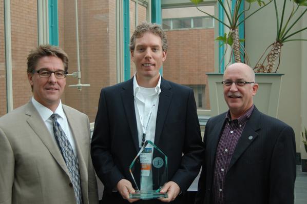 PCLConstruction's tweet photo. Marc Chiasson & Keith Bowers accept PCL Calgary's #CDBI2014 Award of Excellence for @GlacierSkywalk #cdbi #PCLproud http://t.co/sXeso1Ugor