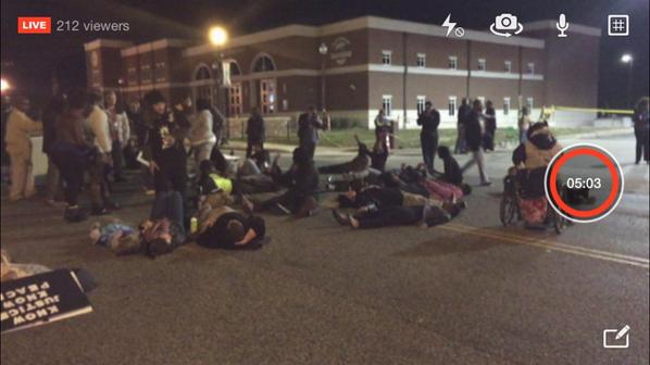 bassem_masri's tweet photo. We lay down in the street blocking it off completely for 4.5 minutes #Ferguson #Shaw #FegusonOctober http://t.co/XwG0tdHk32