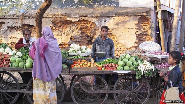 TheEconomist's tweet photo. Modern food retailing has struggled to win customers from India's old-fashioned merchants http://t.co/XIZPYGbm8C http://t.co/WllB5pMoGy