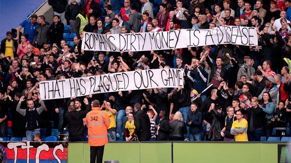 itvfootball's tweet photo. Banner at Crystal Palace: "Roman's dirty money is a disease..." http://t.co/ccpnzXNYQS http://t.co/2wyCMVg3RJ
