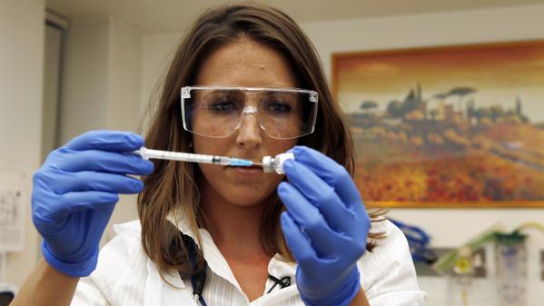 mashable's tweet image. Canada's experimental Ebola vaccine to begin clinical trials overseas. on.mash.to/1wp42CH