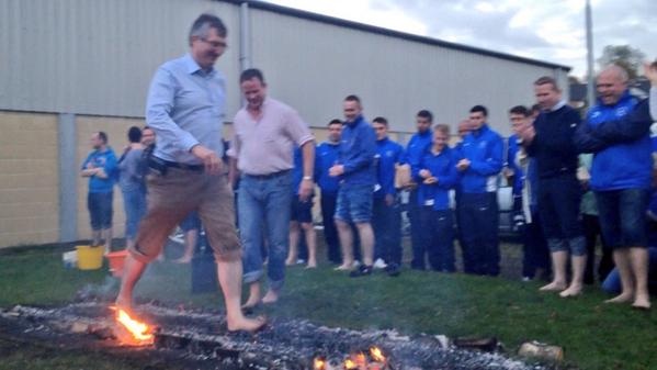 rodneyedwards's tweet photo. PHOTO: Fresh from #UUP2014 in Belfast, @telliott_UUP walks across hot coals at @Ballinamallard for charity. http://t.co/MAYXyw6Qji