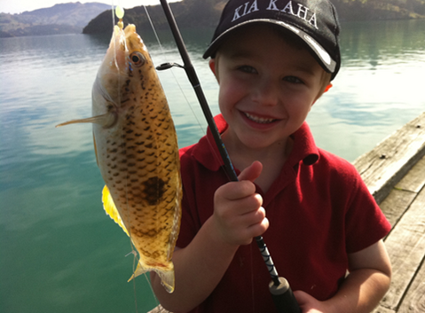 HookMad's tweet photo. Jack's first fish. His smile melts my heart! #hookmad #fishingpic http://t.co/PpOXNncJJb http://t.co/sn9HsocinA