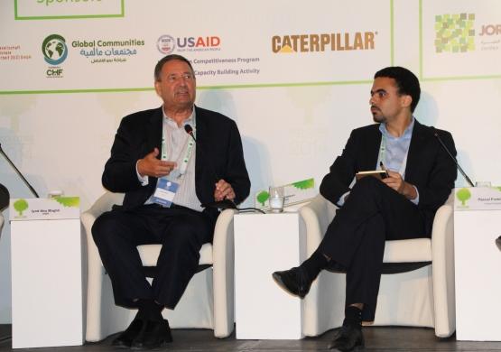 DAIGlobal's tweet photo. One of our board members, Niels Nielsen (left) &amp; @pas_eka on @USAIDJordan @USAID_JCP panel #ecomedjo http://t.co/9ojrA182qC @EcoMed