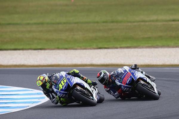 MonsterEnergy's tweet photo. It's a #MonsterEnergy @MotoGP podium sweep! Congrats to @ValeYellow46 @lorenzo99 &amp; @BradleySmith38! #Rossi250 http://t.co/eqHyAQOw1B