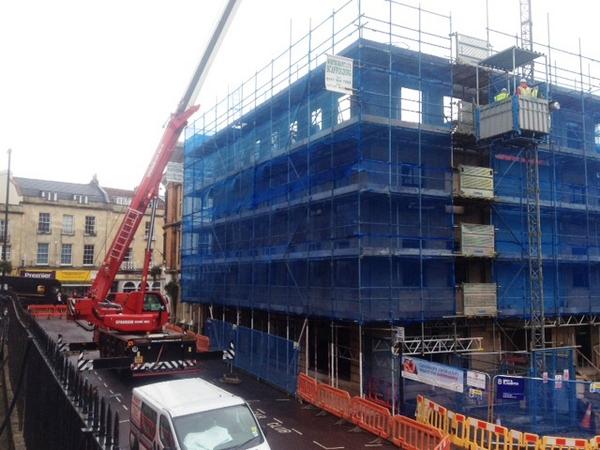 Action shot of the steel frame erection forming new floors at 58 Royal York Crescent in Clifton Village.