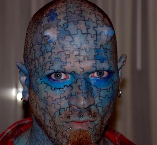 Dave on X: "@markleggett There's this guy, covered in puzzle piece tattoos... http://t.co/NZenNMtAUP" / X