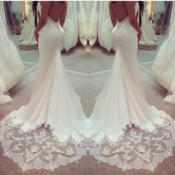WeddingPornx's tweet photo. Open back tight fitted gown ' http://t.co/6qu2TrfKu3