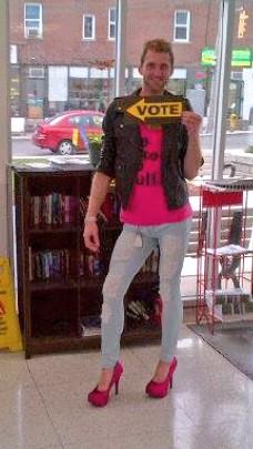 BeckieDileo's tweet photo. CTA grad - getting his vote on in style! Pink stilettos to match #NoBULLying tee. http://t.co/tdyOADOWUL