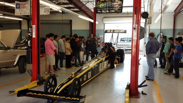 sharpstownctr's tweet image. Students got to experience the #NHRA dragster at #Westbury H.S  from 7 time champion #Schumacher  #armystrong