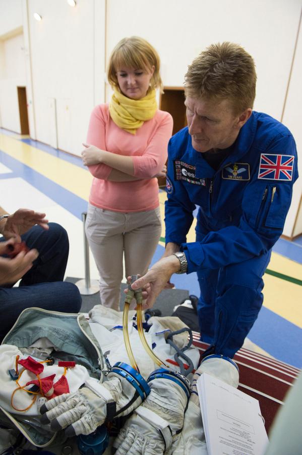 Learning how to use the Soyuz ventilation system to dry a sweaty spacesuit...it gets hot in there! #astrolaundry