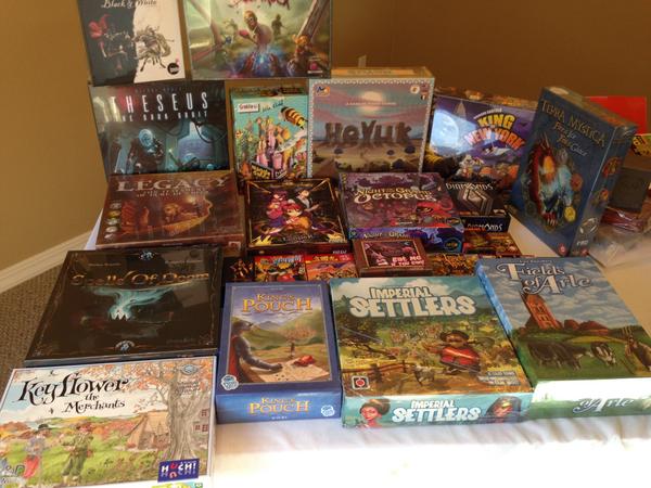 Level99Games's tweet photo. Just unpacked my bags from #essen2014 Here's what I managed to fit into my suitcases and bring back to the USA! :D http://t.co/uBR1jyoLFI