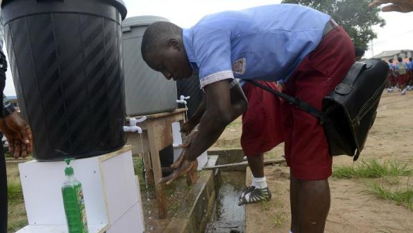 TheEconomist's tweet photo. The Economist explains how Nigeria stopped Ebola http://t.co/tzyZ2U7yXI http://t.co/vzSXlgaYqd