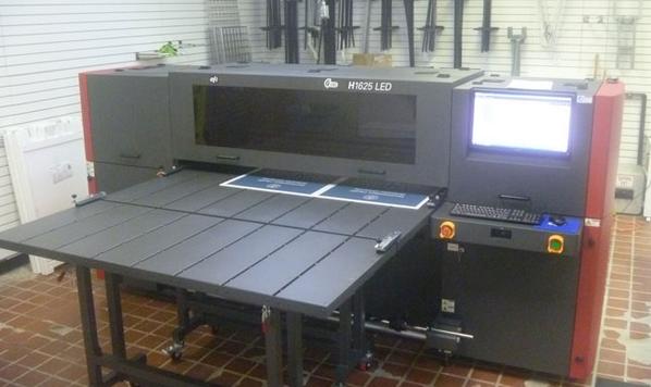 A new dawn for FS Bloomington begins with our new flatbed printer #signs #Bloomington #fastsigns #printing