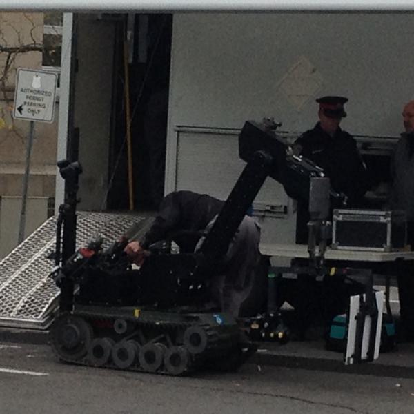 Niagara regional police prepare to deploy a robot at 3 Cross St