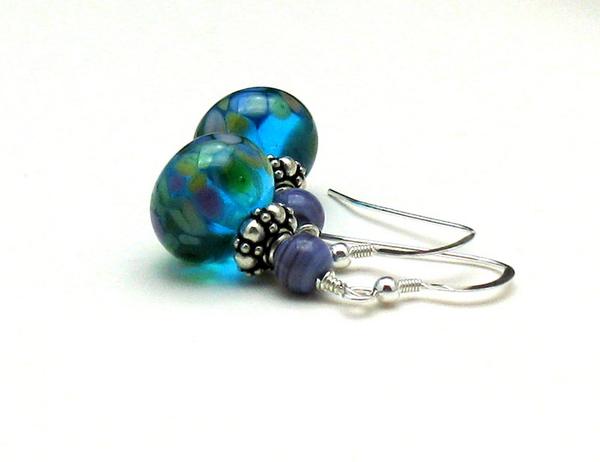 coolerstuff's tweet photo. Bright Teal & Purple Dangle Earrings http://t.co/sp0iZEiYYP #jewelryonetsy @ #coolerstuff #EtsyRetwt http://t.co/hvDTHitP72
