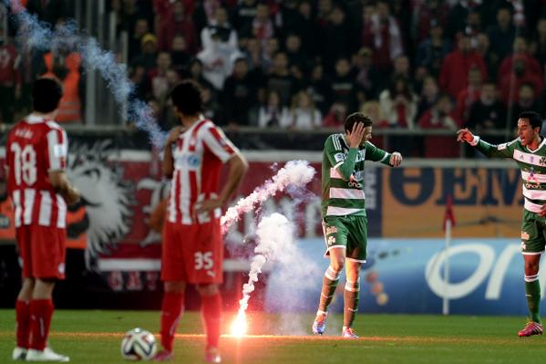BBCSport's tweet photo. Athens derby: ‘Petrol bombs, flares, firecrackers and fights. And that's just on the pitch.’ http://t.co/B2062ZaLCy http://t.co/wo0rnBd7bg