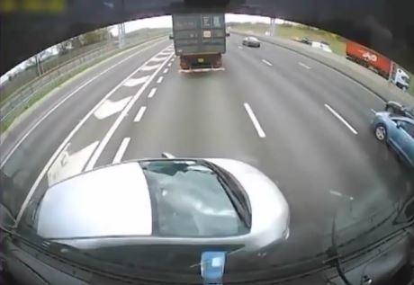 LBC's tweet photo. WATCH: Shocking video of a car being pushed sideways along the M25 by a lorry http://t.co/3ygqDlG2q0 http://t.co/LxVcqITQCV