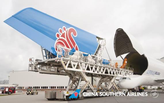 Airbus's tweet photo. MT @ChinaSouthernEU
Is it a monster eating our tail?! Luckily not, this is our #A380 tail being transported by air. http://t.co/3VB25RdGwL