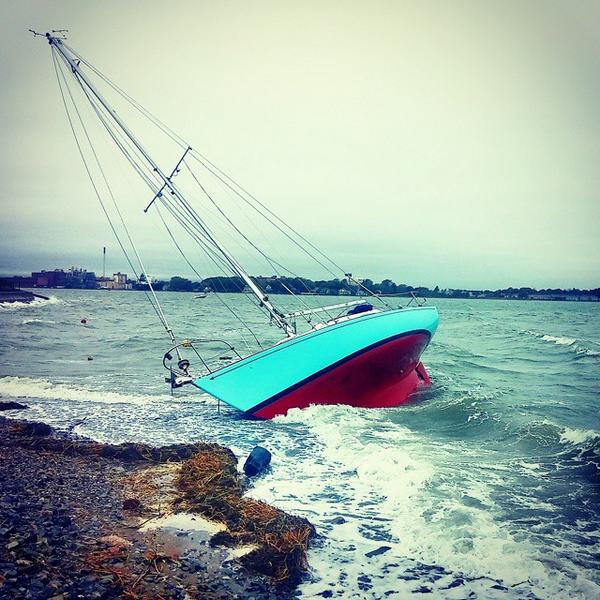 NeEmergencyNews's tweet photo. #Quincy, MA *Storm Damage* Sail boat thrown on shore at #Wessagusset Beach. Credit Josh Cole. #MAWx http://t.co/eZs6ZMp0OC