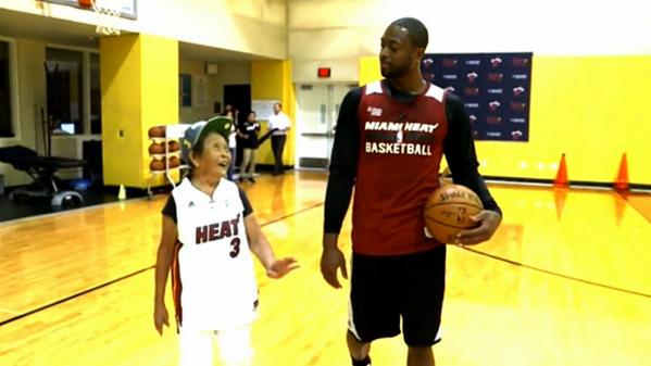 TMZ's tweet photo. WATCH: Dwyane Wade plays 1-on-1 with a 90-year-old... get ready to cry http://t.co/b6wlK4WFGs http://t.co/1ObGySW9jN