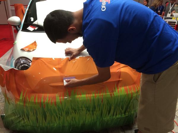 ORAFOL_Americas's tweet photo. @carbonwraps1 is hard at work. Come see the action in booth 1800! #SGIAExpo http://t.co/Z0vPi1Wi2T
