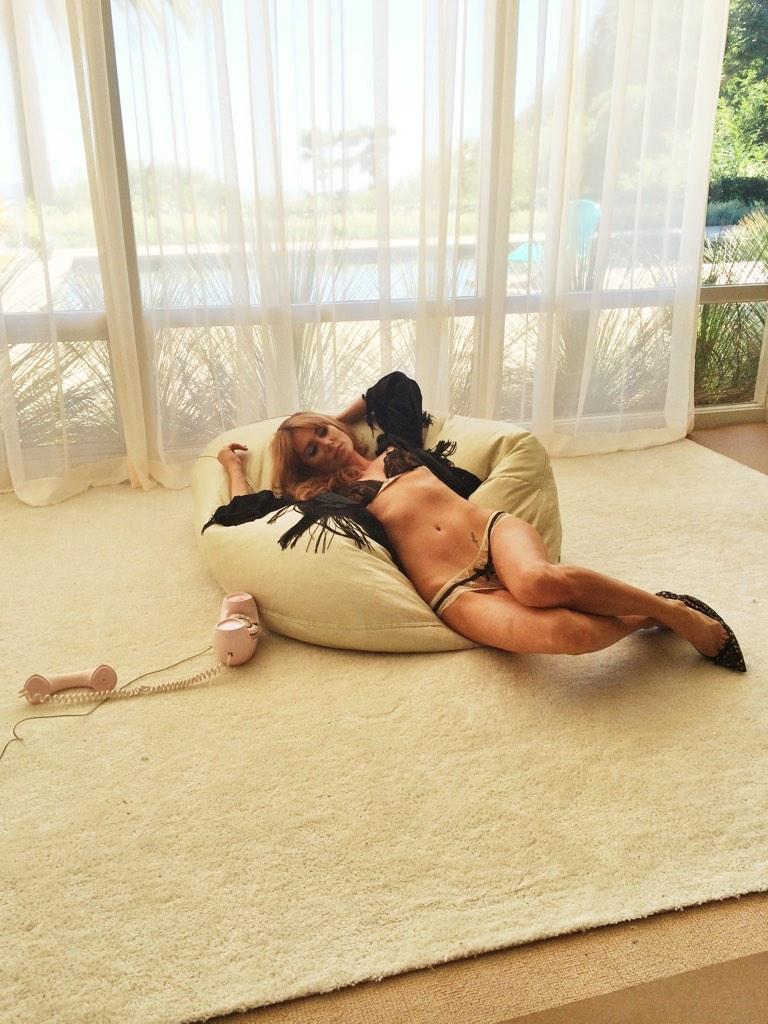 Behind the scenes of my @playboy Playmate of the month shoot. Just casually laying on a beanbag in lingerie http://t.co/JzkZCD3cCF