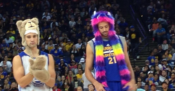 BleacherReport's tweet photo. VIDEO: The Warriors made rookie Aaron Craft dress as a bear and sing “Party In the USA” http://t.co/Lpo5dSMuOJ http://t.co/ifze0zX5a8