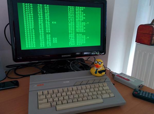 twh1st's tweet photo. @nacin @fhinkel Explaining the rubber duck 6502 assembly. Hope to find the nasty bug . #atari http://t.co/cf0W6O7ZL3 http://t.co/VTFHabruYJ