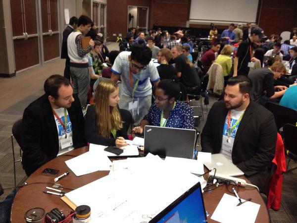 ms_pham_science's tweet photo. #edapphack #EAH13 our tdsb hackathoners discussing project with the organizers http://t.co/DwLqkHH0MC